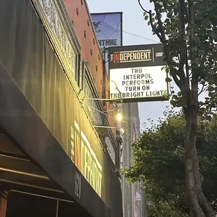 a crowd of people outside a theater