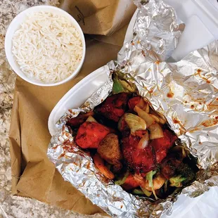 Mix grill platter (chicken tikka, lamb kabob, shrimp) / $18.15