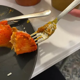 a plate of food being eaten