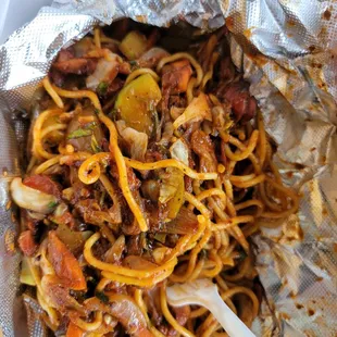 I forgot the complete name but the dish is beyond spicy. Just go to the noodle section