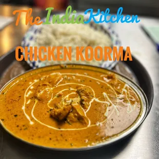 a plate of chicken korma