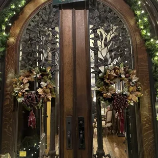 the front door decorated for christmas