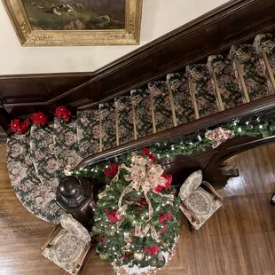 a christmas tree on the stairs
