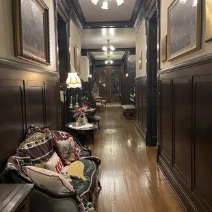 a long hallway with wood paneling