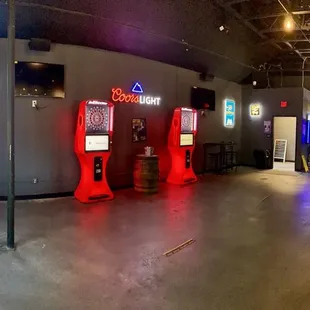 Dart boards, jukebox golf machine.