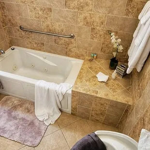 Wonderful jacuzzi style tub, spacious bathroom.