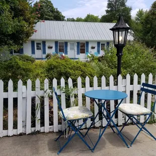 Bistro chairs on the pool deck
