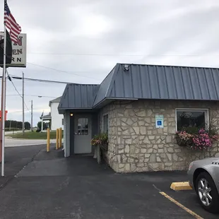 a car parked in front of the inn