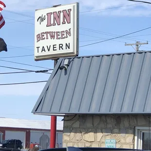 a car parked in front of the inn