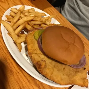 a fish sandwich and french fries