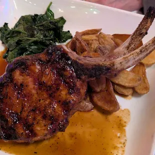 The pork chop is a really nice double cut. A bit mild in flavor. It's served medium.