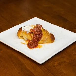 Sausage Roll with homemade vegetarian Italian Sausage, and Poached Egg, Red Sauce