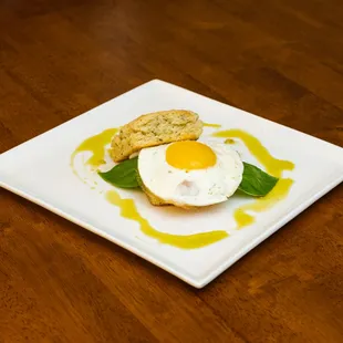 Focaccia Sandwich - homemade focaccia with roasted tomato, mozzarella, egg, basil oi.