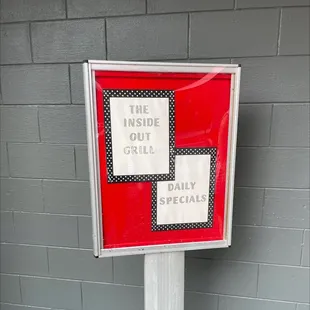 a sign on a pole