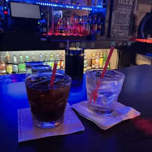 two drinks on a bar counter