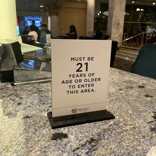 a sign that reads must be 21 years of age or older in this area
