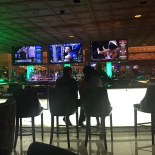 people sitting at the bar