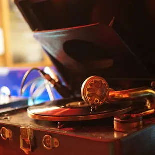 a record player and a laptop