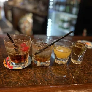 ows four different types of alcoholic drinks