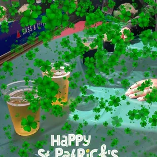 ows a table covered in shamrock leaves