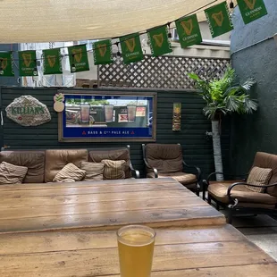 ows a glass of beer on a table