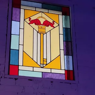 a red bull stained glass window