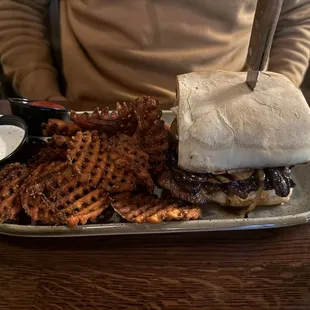 Steakhouse sandwich with sweet potato waffle fries