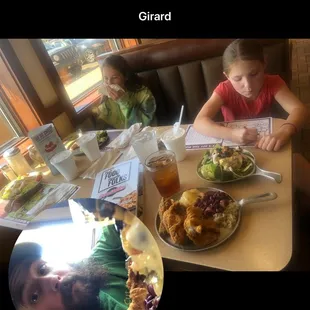 a child and a plate of food