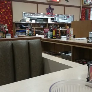 a glass of water on a table in a restaurant