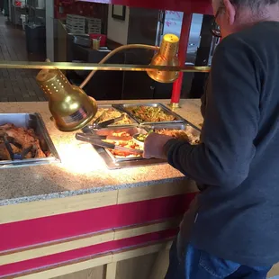 a man preparing food