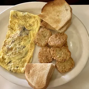 Omelette, toast, and hash browns
