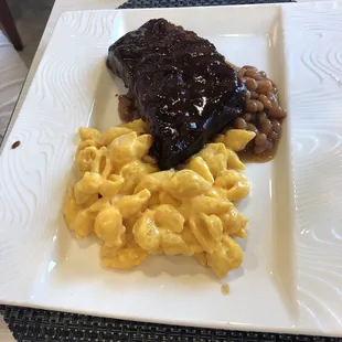 a plate of food with macaroni and cheese
