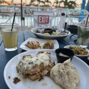 Chicken CHX PICCATA, GROUPER &amp; CRAB CAKE, raw oysters, margarita and mojito.