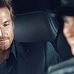 a man talking on a cell phone