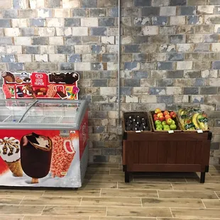 a display of ice cream and fruit