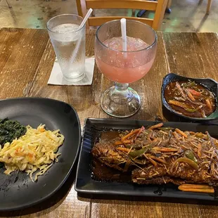 Brown Stew Fish (Red Snapper), Spinach, and Cabbage.