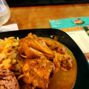 a plate of food and a menu