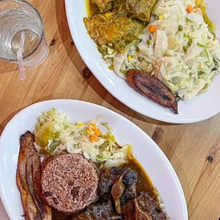 two plates of food on a wooden table
