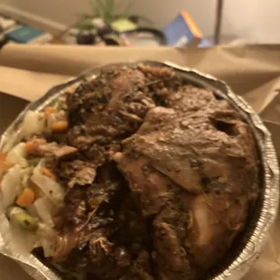 a plate of meat and vegetables