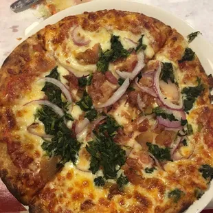 Brick oven pizza with bacon onion n spinach