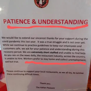 a sign stating that the restaurant is not open