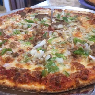 Pizza with meatballs and peppers and onions