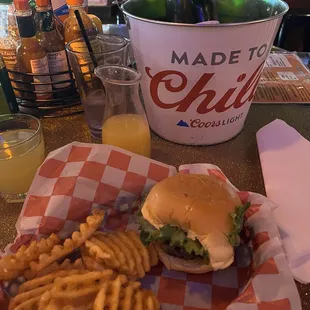 Smash burger, waffle fries, mimosa bucket