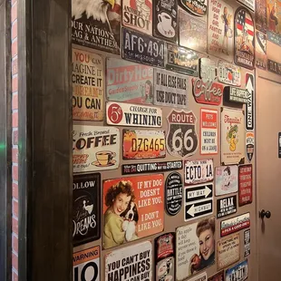a wall full of signs