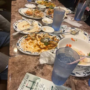 a table full of food and drinks