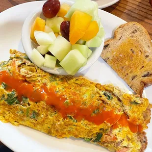 Build your own omelette-chorizo with all the veggies, cinnamon raisin bread and fruit