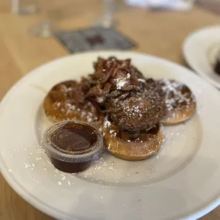 Waffles with bacon topped with honey maple syrup
