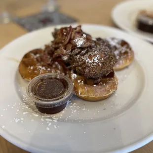 Waffles with bacon topped with honey maple syrup
