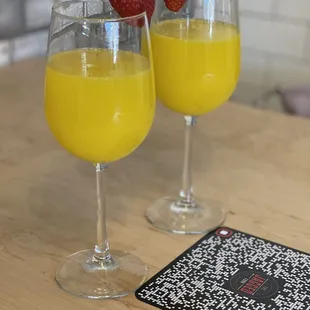 Morning mimosas with a strawberry to top it off