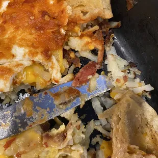 Piece of ham in the hashbrowns/Huevos Rancheros